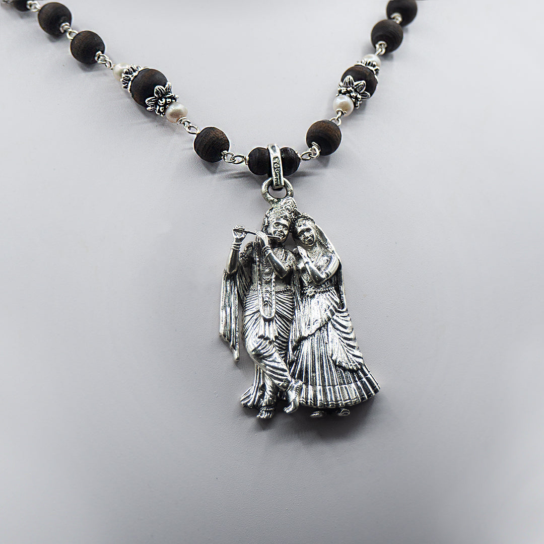 Pearl Tulasi Mala With a Radha Krishna Pendant.