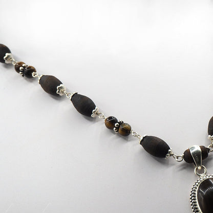 Tigerstone Silver Tulasi Kanti Mala With a Round Pendant.