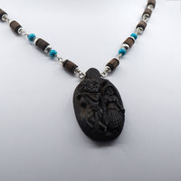 Turquoise stones Mala with Wood Carved Radha Krishna Pendant